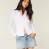 Açık Renk Yıkanmış Çivili Denim Mini Etek Açık Renk Yıkanmış Çivili Denim Mini Etek