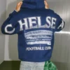 Chelsea Futbol Kulübü Grafik Fermuarlı Kapüşonlu Sweatshirt Chelsea Futbol Kulübü Grafik Fermuarlı Kapüşonlu Sweatshirt