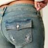 Düşük Bel Kelebek Nakışlı Orta Yıkama Bootcut Kot Pantolon Düşük Bel Kelebek Nakışlı Orta Yıkama Bootcut Kot Pantolon