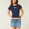 Düşük Bel Nakışlı Fiyonklu Denim Mini Etek