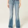 Düşük Bel Yıpranmış Orta Yıkama Bootcut Kot Pantolon