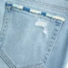 Düşük Bel Yırtık Açık Renkli Nakışlı Bootcut Kot Pantolon Düşük Bel Yırtık Açık Renkli Nakışlı Bootcut Kot Pantolon