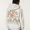 Kutu Kesim Fermuarlı Miami Üniversitesi Hurricanes Grafik Kapüşonlu Sweatshirt Kutu Kesim Fermuarlı Miami Üniversitesi Hurricanes Grafik Kapüşonlu Sweatshirt