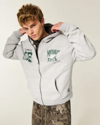 Kutu kesim fermuarlı Michigan State University Spartans grafik kapüşonlu sweatshirt Kutu kesim fermuarlı Michigan State University Spartans grafik kapüşonlu sweatshirt