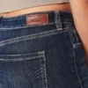 Kıvrımlı Orta Bel Koyu Yıkama Boot Jeans