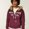 Suni Kürk Süslü Fermuarlı Logo Grafik Kapüşonlu Sweatshirt Suni Kürk Süslü Fermuarlı Logo Grafik Kapüşonlu Sweatshirt