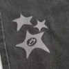 Yıkanmış Siyah Yıldız Grafik Bol Paça Kot Pantolon